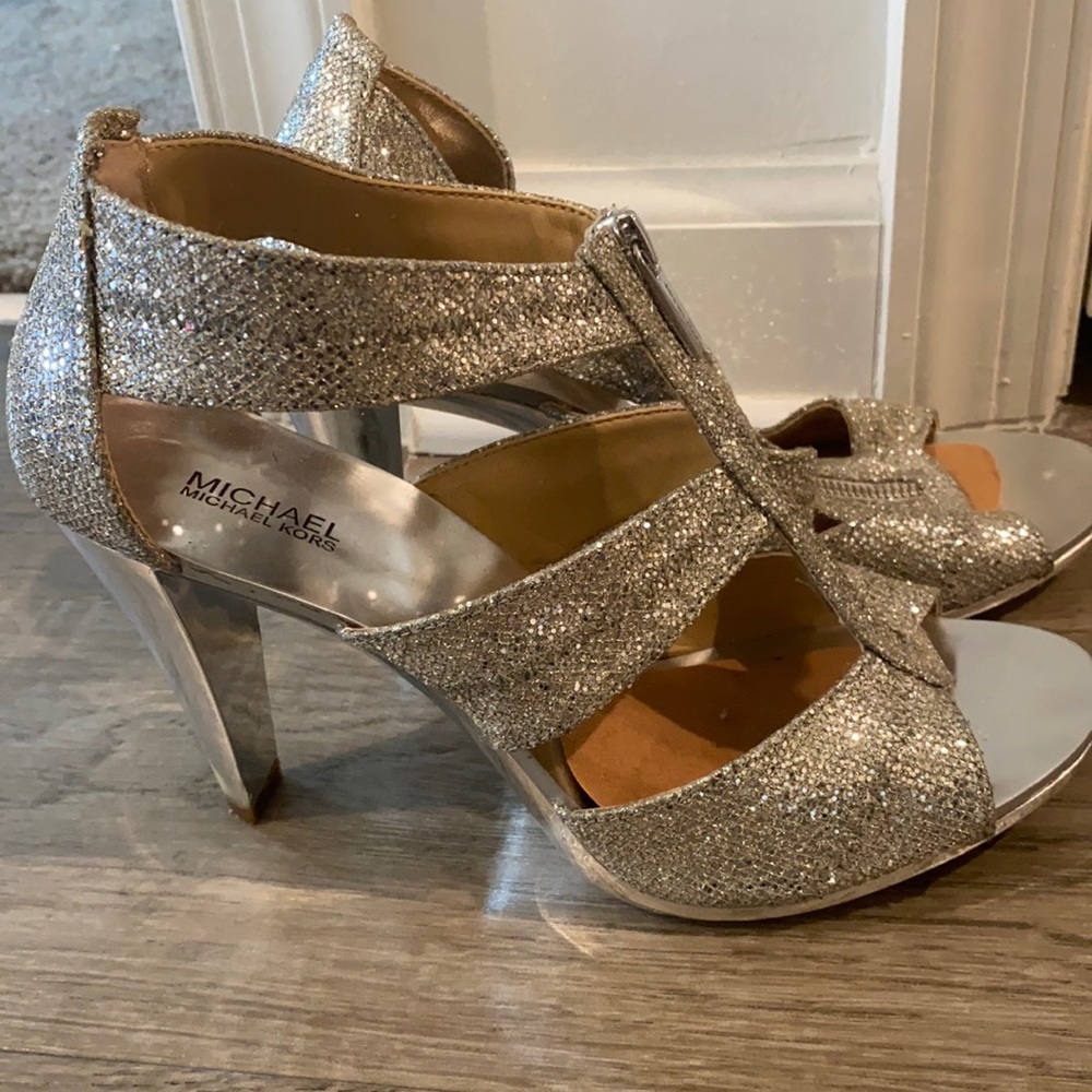A silver-tone glitter upper and galvanized heel